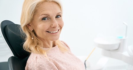 Woman smiling in the dental chair