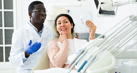 Woman smiling in the dental chair