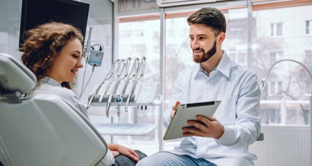 Woman smiling at dentist