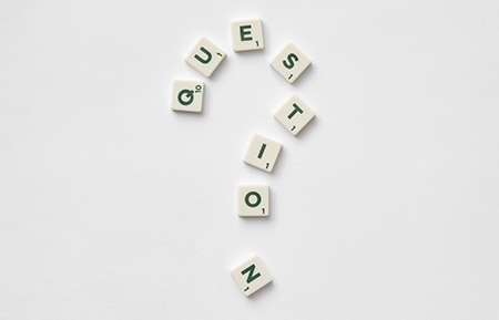 Questions spelled using Scrabble tiles