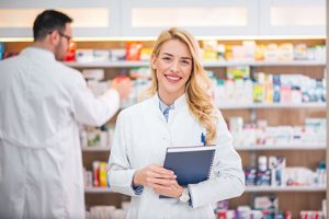 A pharmacist smiling