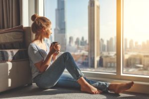 Healthy woman in quarantine practices tips from her Gainesville dentist