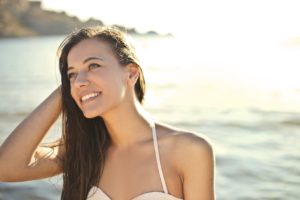 Woman with attractive smile at beach