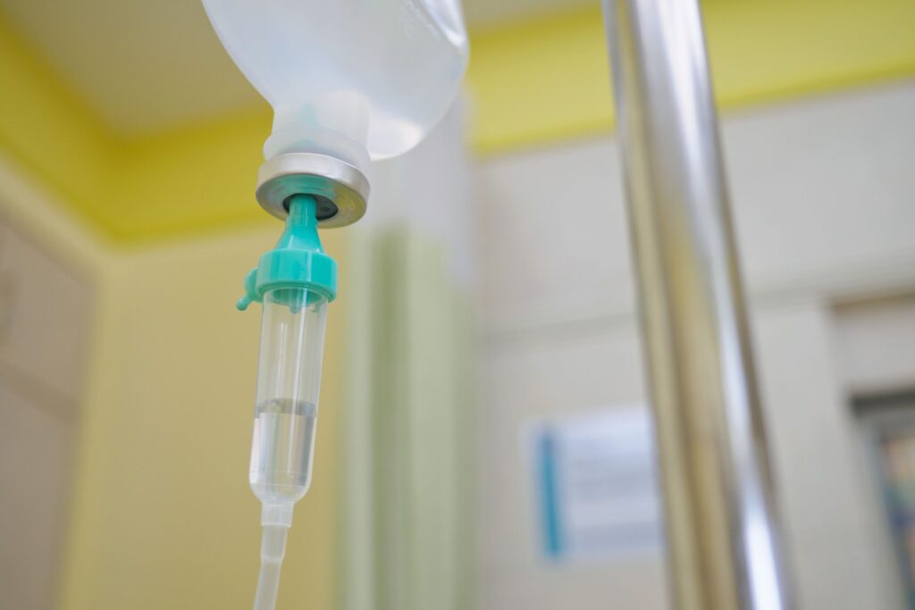 Closeup of IV sedation setup in yellow room