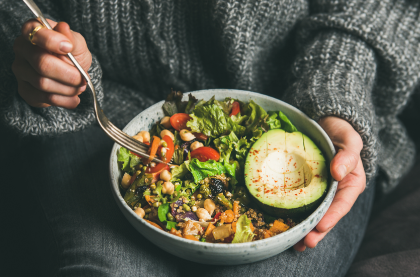 Woman eating salad